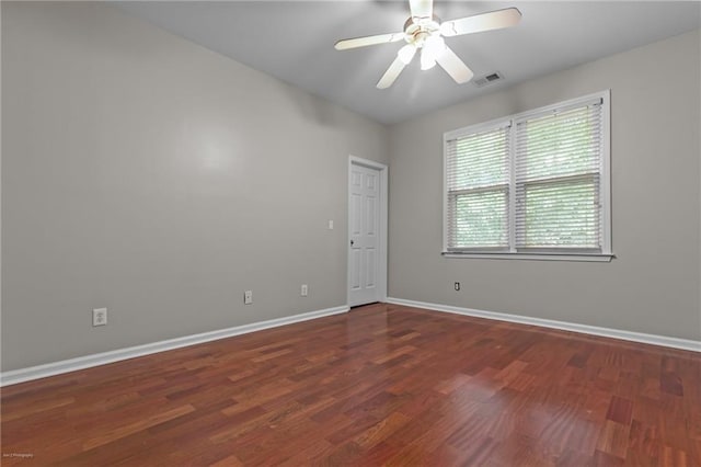 2990 Hearthstone Dr, Cumming, GA 30041 - spare room featuring baseboards, wood finished floors, and a ceiling fan