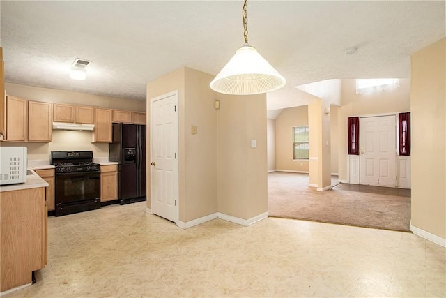 4103 Kingship Dr, Ellenwood, GA 30294 - kitchen with black appliances, light floors, baseboards, under cabinet range hood, and light countertops