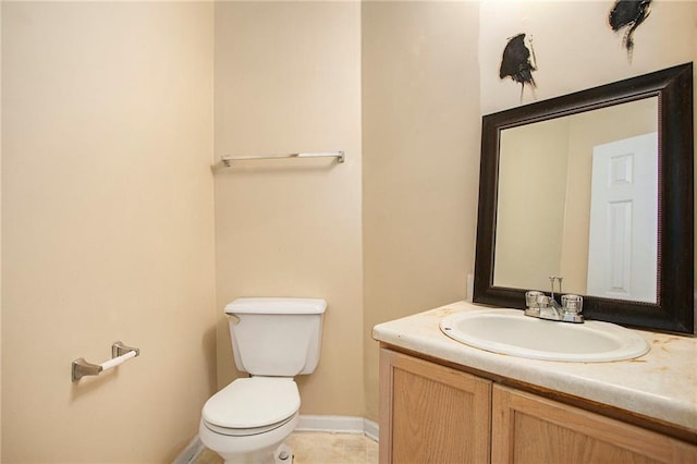 4103 Kingship Dr, Ellenwood, GA 30294 - half bathroom featuring toilet, vanity, baseboards, and tile patterned flooring