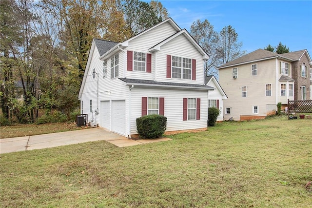 4103 Kingship Dr, Ellenwood, GA 30294 - view of side of home featuring driveway, a garage, a lawn, and cooling unit