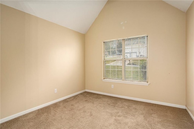 4103 Kingship Dr, Ellenwood, GA 30294 - carpeted empty room featuring vaulted ceiling and baseboards