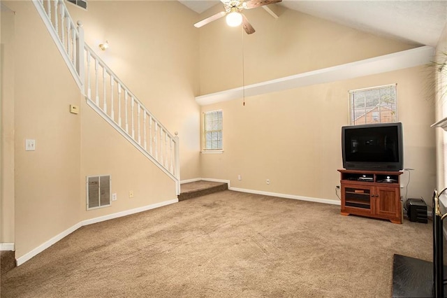 4103 Kingship Dr, Ellenwood, GA 30294 - unfurnished living room with carpet flooring, a ceiling fan, baseboards, and high vaulted ceiling
