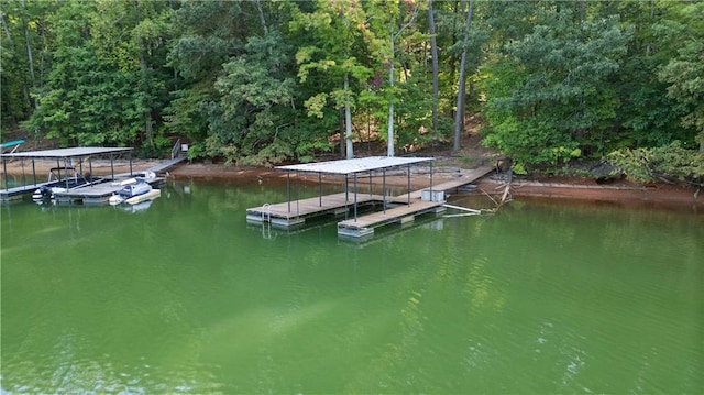 view of dock with a water view