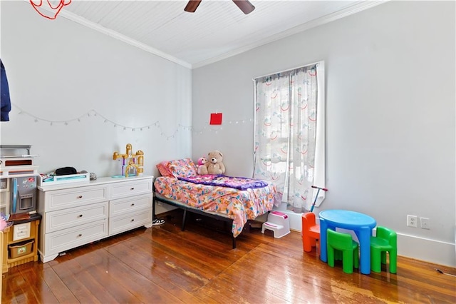 bedroom with ceiling fan, dark wood-style floors, and crown molding