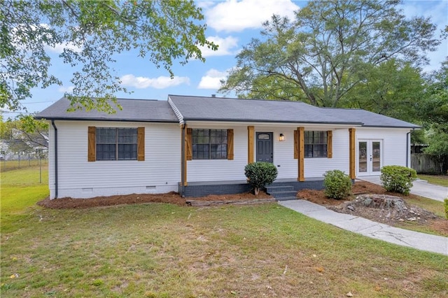 single story home with a porch and a front lawn