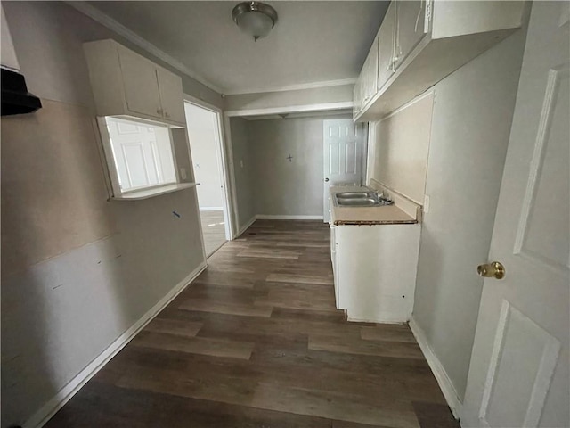 1440 Kenilworth Dr SW, Atlanta, GA 30310 - hall with dark wood-style flooring, a sink, and baseboards