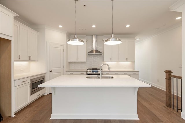 350 Olmstead Way Unit 29, Alpharetta, GA 30022 - kitchen featuring wall chimney range hood, appliances with stainless steel finishes, a sink, tasteful backsplash, and white cabinetry