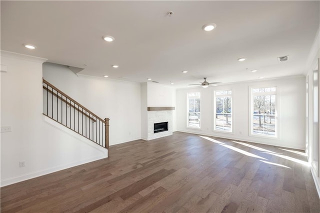 350 Olmstead Way Unit 29, Alpharetta, GA 30022 - unfurnished living room featuring crown molding, a ceiling fan, recessed lighting, stairs, and wood finished floors