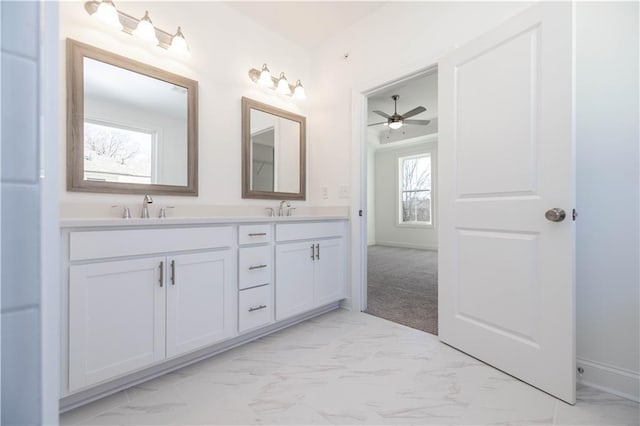 350 Olmstead Way Unit 29, Alpharetta, GA 30022 - bathroom featuring marble look tiles, double vanity, and a ceiling fan
