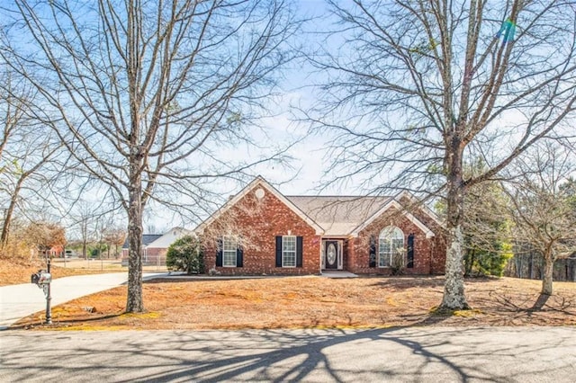 view of front of house with brick siding