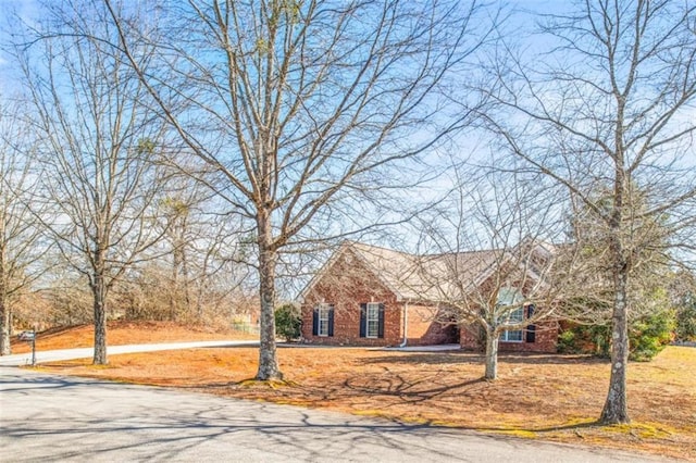 view of front of property featuring brick siding