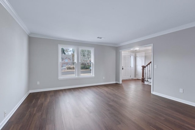 unfurnished room featuring dark hardwood / wood-style floors and ornamental molding