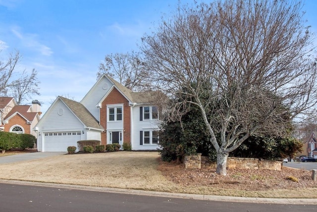 view of front of property featuring a garage