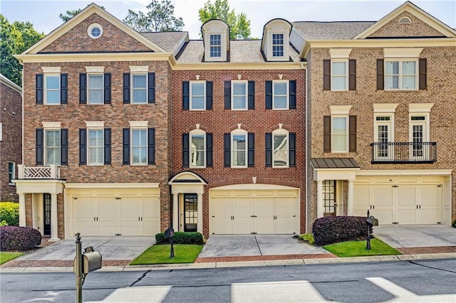4742 Legacy Cove Ln, Smyrna, GA 30126 - view of front of house with an attached garage, driveway, and brick siding