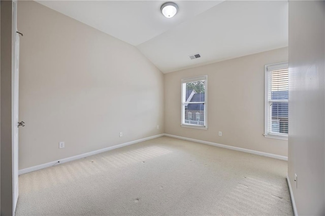 4742 Legacy Cove Ln, Smyrna, GA 30126 - empty room with lofted ceiling and light carpet