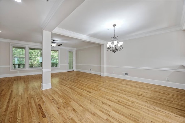 4742 Legacy Cove Ln, Smyrna, GA 30126 - spare room featuring a chandelier, light wood finished floors, crown molding, and ceiling fan