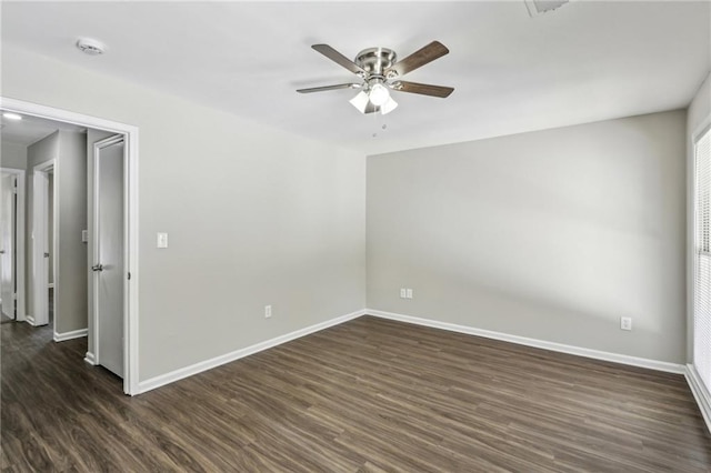 4322 Idlewood Ln, Tucker, GA 30084 - unfurnished room featuring dark wood-type flooring, ceiling fan, and baseboards