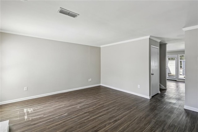 4322 Idlewood Ln, Tucker, GA 30084 - unfurnished room with baseboards, visible vents, ornamental molding, and dark wood-style flooring