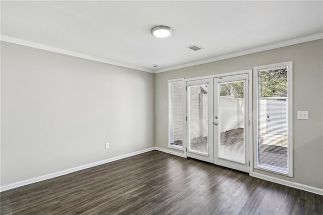 4322 Idlewood Ln, Tucker, GA 30084 - empty room featuring french doors, crown molding, baseboards, and dark wood finished floors