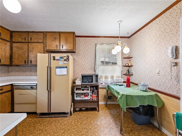 784 San Miguel Dr, Stone Mountain, GA 30083 - kitchen featuring freestanding refrigerator, dishwasher, stainless steel microwave, wallpapered walls, and crown molding