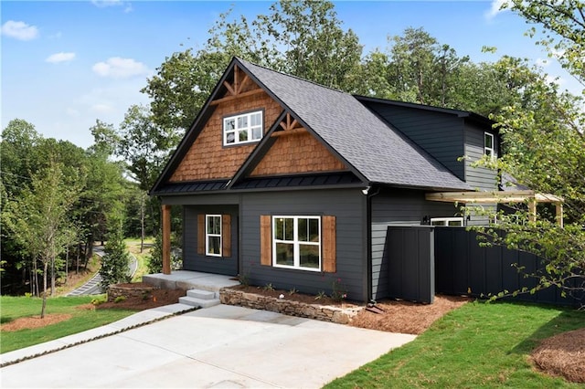 110 Red Cloud Walk, Waleska, GA 30183 - craftsman house featuring a front yard, fence, and roof with shingles