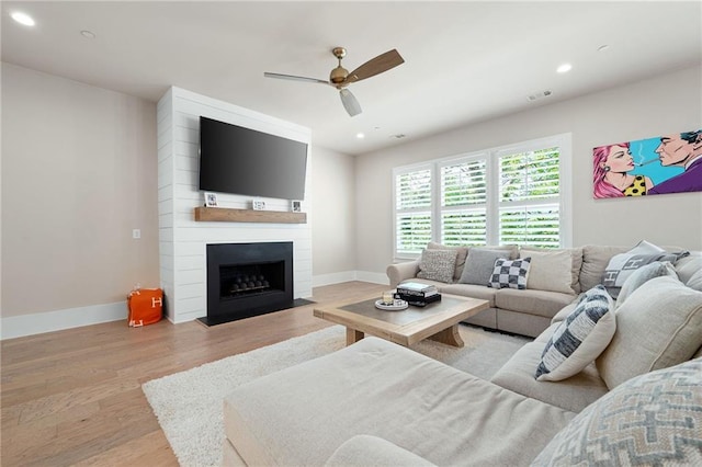 920 Wemberley Ln, Marietta, GA 30064 - living room with ceiling fan, wood finished floors, baseboards, recessed lighting, and a large fireplace