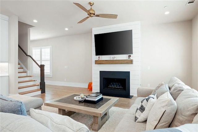 920 Wemberley Ln, Marietta, GA 30064 - living room with light wood-style flooring, a ceiling fan, recessed lighting, stairs, and baseboards