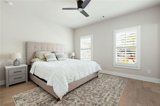920 Wemberley Ln, Marietta, GA 30064 - bedroom with baseboards, light wood-style flooring, and a ceiling fan