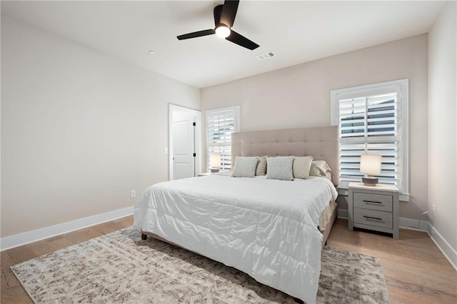 920 Wemberley Ln, Marietta, GA 30064 - bedroom featuring baseboards, light wood-style floors, and a ceiling fan