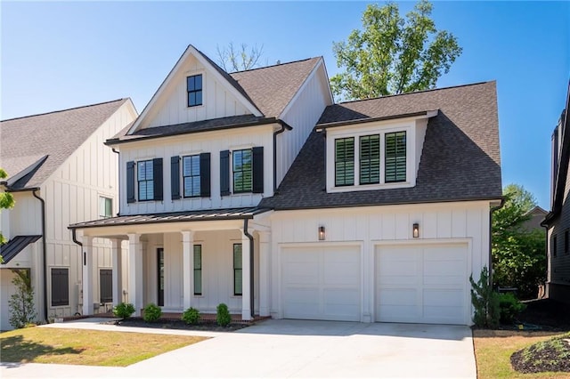 920 Wemberley Ln, Marietta, GA 30064 - modern inspired farmhouse with driveway, a shingled roof, covered porch, and board and batten siding