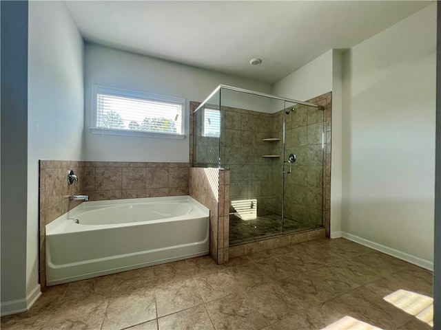 bathroom featuring plus walk in shower