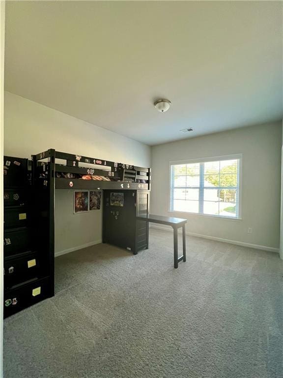 unfurnished bedroom featuring carpet floors