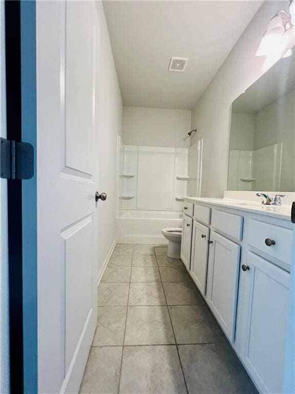 full bathroom featuring tile patterned floors, vanity, toilet, and shower / bathtub combination