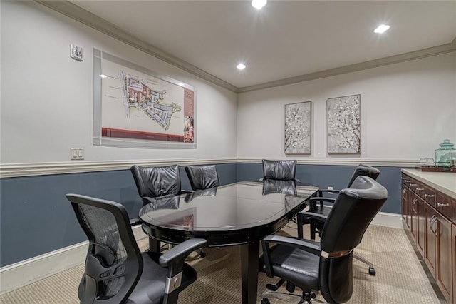 carpeted office space featuring crown molding