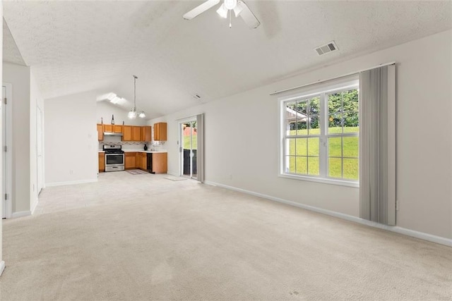 2428 Buena Vista Cir, Gainesville, GA 30504 - unfurnished living room with light colored carpet, a ceiling fan, vaulted ceiling, baseboards, and a textured ceiling