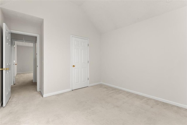 2428 Buena Vista Cir, Gainesville, GA 30504 - unfurnished bedroom with light carpet, baseboards, vaulted ceiling, and attic access