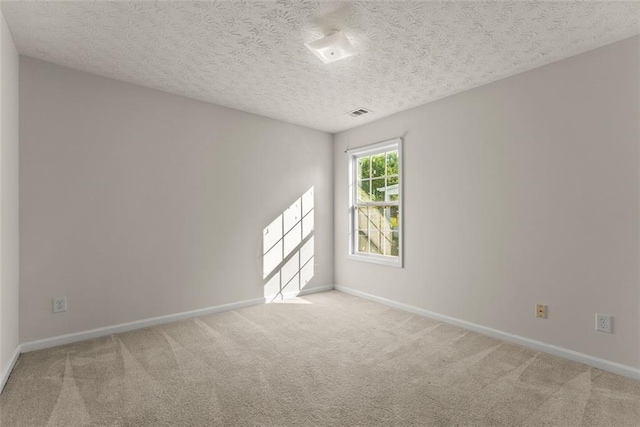 2428 Buena Vista Cir, Gainesville, GA 30504 - empty room featuring carpet, baseboards, and a textured ceiling