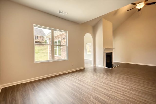 unfurnished living room with hardwood / wood-style flooring and ceiling fan