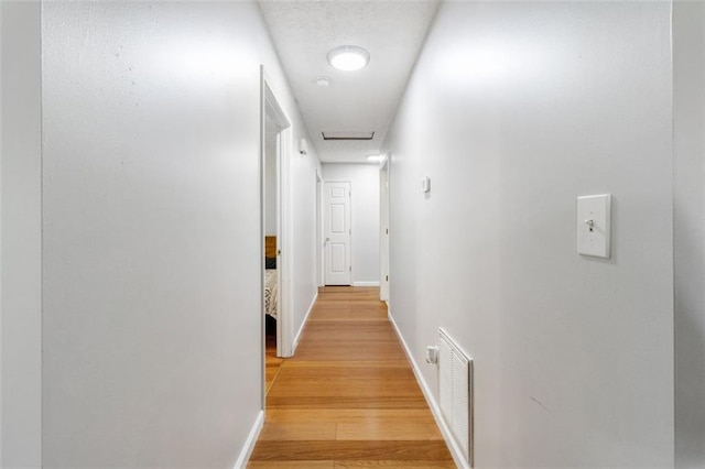 hallway featuring light wood-type flooring