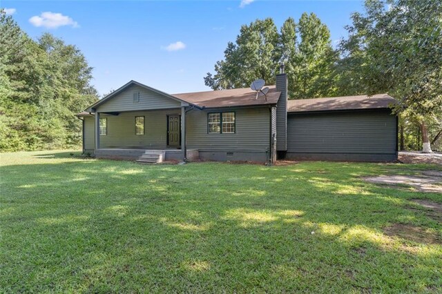 view of front of home with a front yard