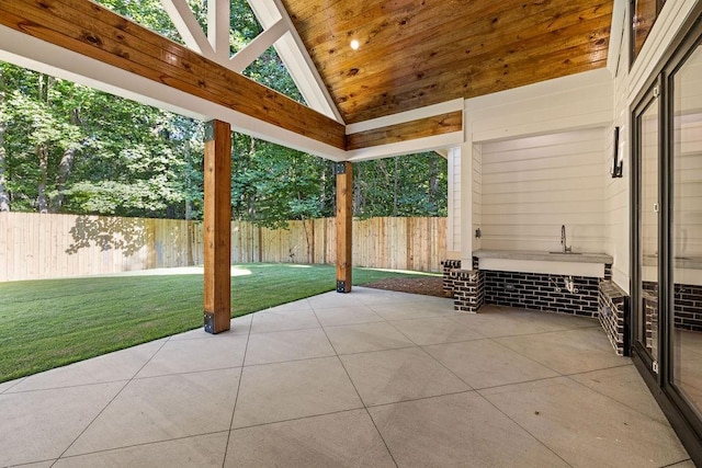 view of patio featuring fence