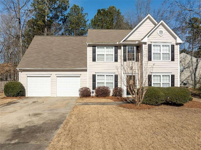 view of front of home with a garage