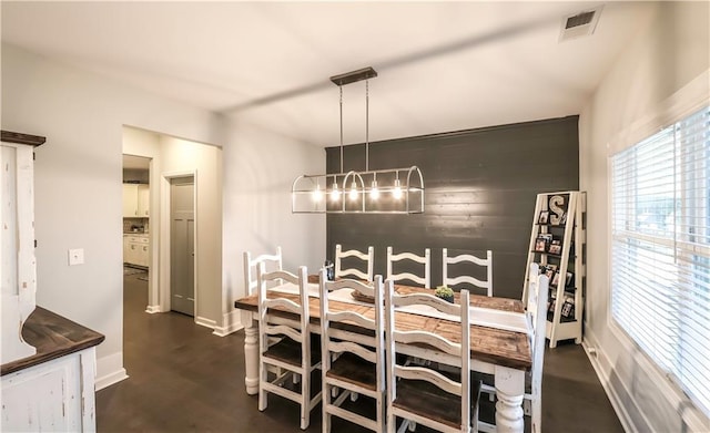 dining area with a chandelier