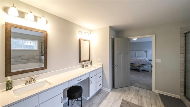 bathroom with vanity and walk in shower