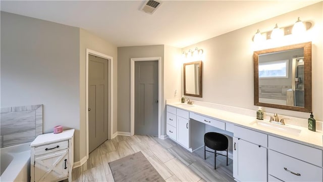 bathroom featuring vanity