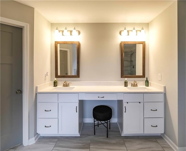 bathroom featuring vanity and walk in shower