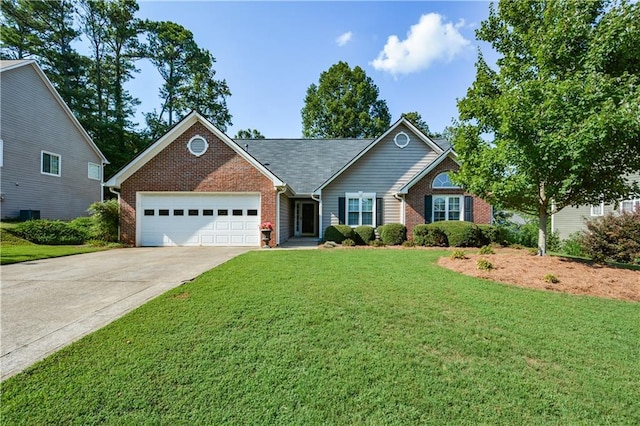 view of front of home featuring a garage and a front lawn