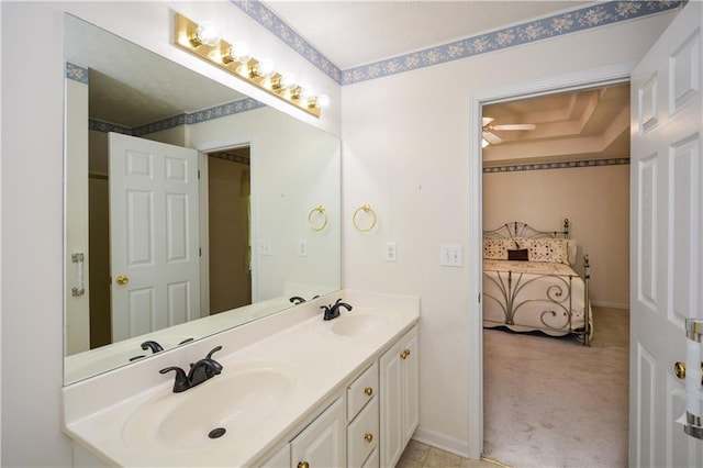 bathroom featuring vanity and ceiling fan