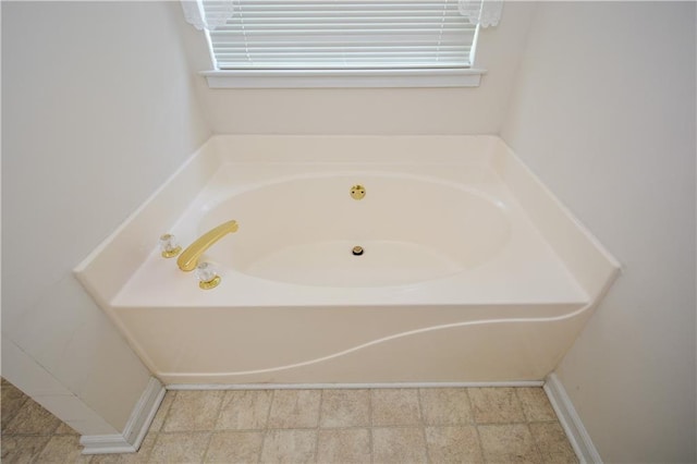 bathroom featuring a tub