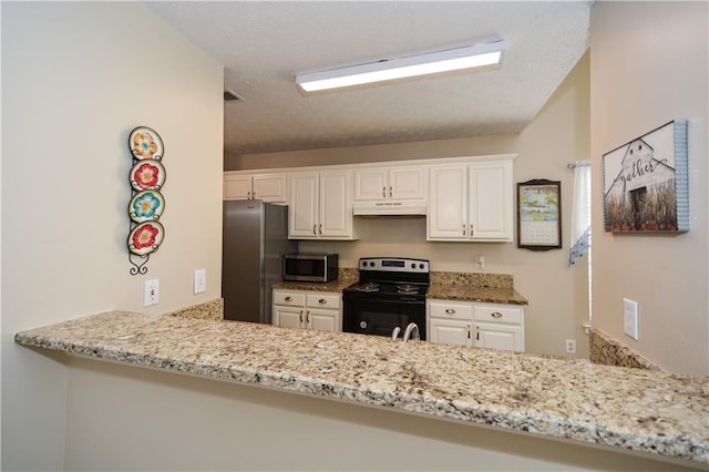 kitchen featuring kitchen peninsula, appliances with stainless steel finishes, white cabinetry, and light stone counters